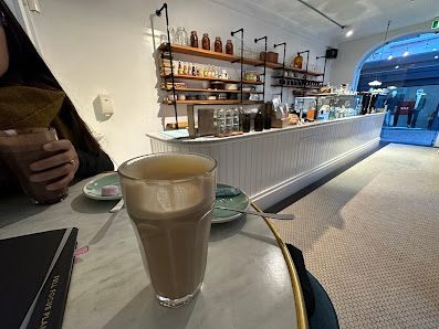Milk coffee at the bar